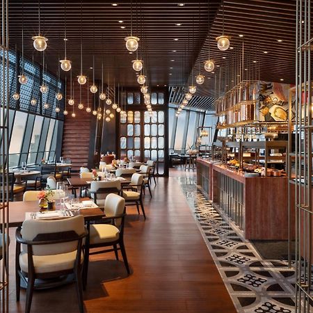 Four Seasons Hotel Далиен Екстериор снимка