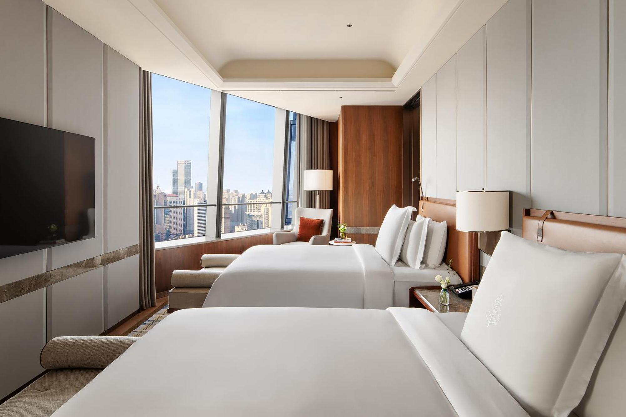 Four Seasons Hotel Далиен Екстериор снимка